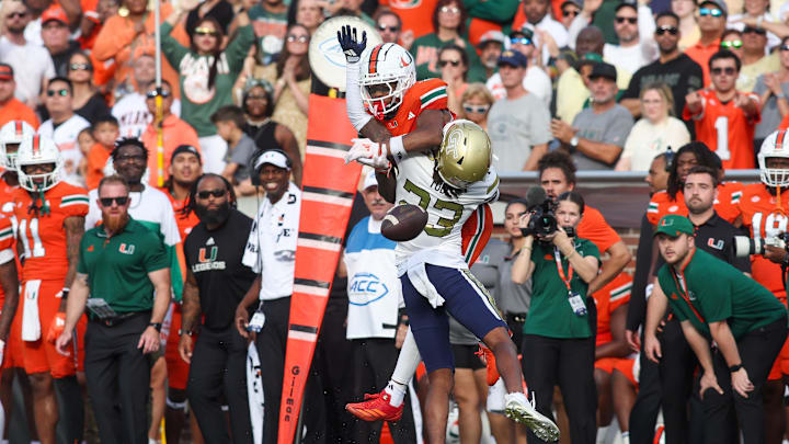 Nov 9, 2024; Atlanta, Georgia, USA; Georgia Tech Yellow Jackets defensive back Zachary Tobe (23) breaks up a pass intended for Miami Hurricanes wide receiver Isaiah Horton (2) in the fourth quarter at Bobby Dodd Stadium at Hyundai Field. Mandatory Credit: Brett Davis-Imagn Images
