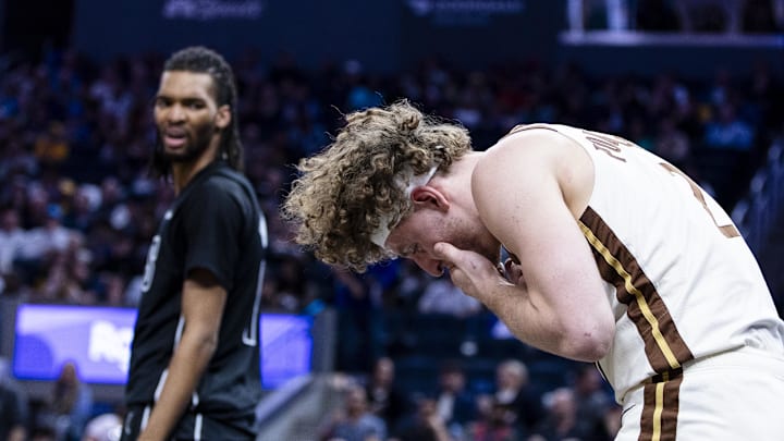 Mar 25, 2026; San Francisco, California, USA; Golden State Warriors guard Brandin Podziemski (2) reacts after getting hit in the face by a Brooklyn Nets player during the third quarter at Chase Center. Mandatory Credit: John Hefti-Imagn Images