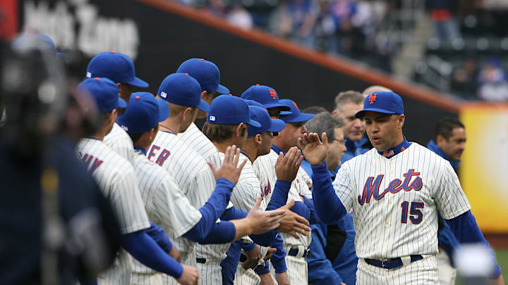 Mets home opener vs. Washington Nationals. (right) NY Mets #15 Carlos Beltran takes the field during the opening ceremonies before the start of the game.

Beltran 1