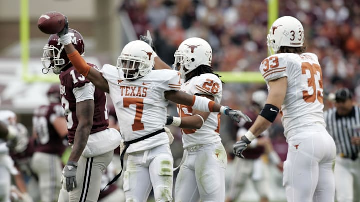 Nov 23, 2007; College Station, TX, USA; Texas Longhorns Texas cornerback Deon Beasley (7) celebrates after recovering a fumble against the Texas A&M Aggies in the second quarter at Kyle Field. Texas A&M beat Texas 38-30. Mandatory Credit: Brett Davis-Imagn Images