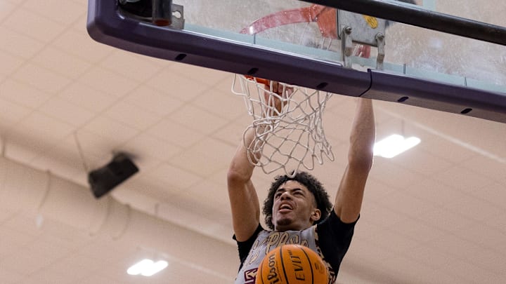 Andress’ Carmello Jackson Hayward (22) dunks the ball during a District 1-5A boys basketball game against Burges on Tuesday, Feb. 3, 2026, at Burges High School in El Paso, Texas. Andress’ Carmello Jackson Hayward (22) dunks the ball during a District 1-5A boys basketball game against Burges on Tuesday, Feb. 3, 2026, at Burges High School in El Paso, Texas.