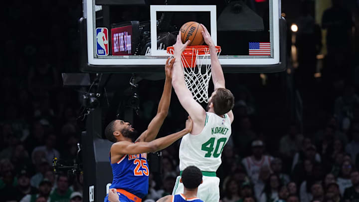 May 5, 2025; Boston, Massachusetts, USA; Boston Celtics center Luke Kornet (40) makes the basket against New York Knicks forward Mikal Bridges (25) in the first quarter during game one of the second round for the 2025 NBA Playoffs at TD Garden. Mandatory Credit: David Butler II-Imagn Images May 5, 2025; Boston, Massachusetts, USA; Boston Celtics center Luke Kornet (40) makes the basket against New York Knicks forward Mikal Bridges (25) in the first quarter during game one of the second round for the 2025 NBA Playoffs at TD Garden. Mandatory Credit: David Butler II-Imagn Images