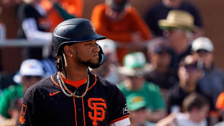 Mar 17, 2024; Scottsdale, Arizona, USA; San Francisco Giants infielder Luis Matos (29) reacts during
