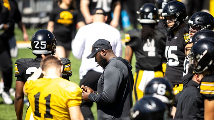 Apr 26, 2025; Iowa City, IA, USA; Iowa tight ends and fullbacks coach Abdul Hodge writes down notes during a spring NCAA football open practice at Kinnick Stadium. Mandatory Credit: Joseph Cress/For the Register