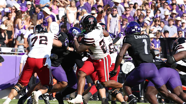 Oct 26, 2024; Fort Worth, Texas, USA;  Texas Tech Red Raiders running back Tahj Brooks (28) runs for a touchdown against the TCU Horned Frogs in the second quarter at Amon G. Carter Stadium. Mandatory Credit: Tim Heitman-Imagn Images