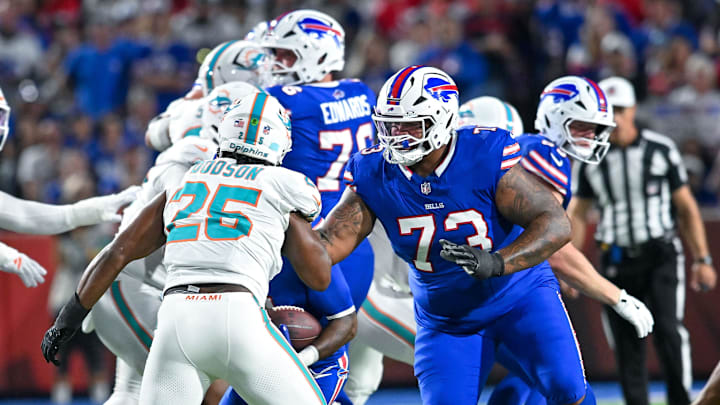 Bills offensive tackle Dion Dawkins (73) blocks against the Dolphins in Week 3.