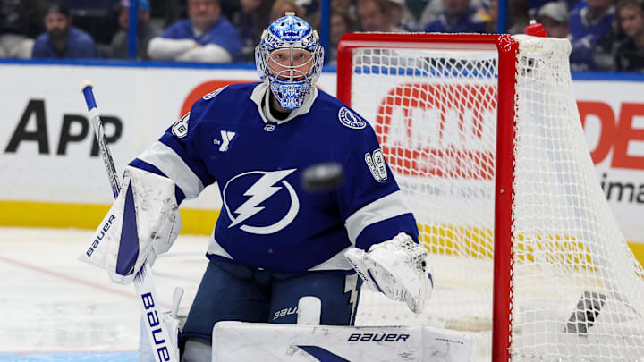 Feb 23, 2025; Tampa, Florida, USA; Tampa Bay Lightning goaltender Andrei Vasilevskiy (88) watches the puck against the Seattle Kraken in the second period at Amalie Arena. Mandatory Credit: Nathan Ray Seebeck-Imagn Images