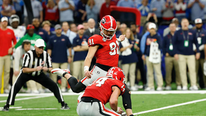 Jan 1, 2026; New Orleans, LA, USA; Georgia Bulldogs place kicker Peyton Woodring (91) kicks a field goal against the Mississippi Rebels in the fourth quarter during the 2025 Sugar Bowl and quarterfinal game of the College Football Playoff at Caesars Superdome. Mandatory Credit: Geoff Burke-Imagn Images