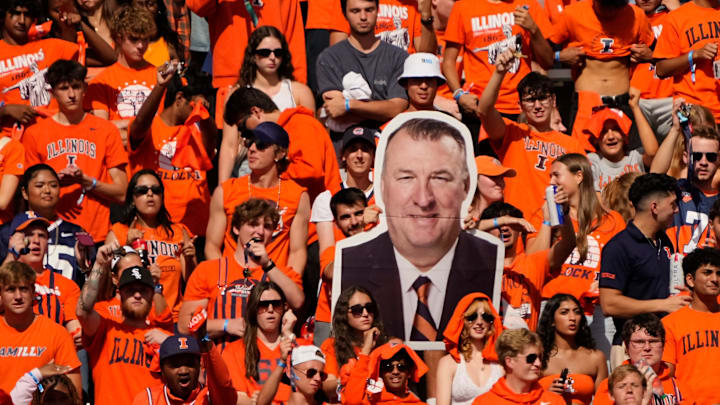 Illinois students hold a cutout of Illinois head coach Bret Bielema during the second half of the NCAA football game at Gies Memorial Stadium in Champaign on Oct. 11, 2025. Ohio State won 34-16. Illinois students hold a cutout of Illinois head coach Bret Bielema during the second half of the NCAA football game at Gies Memorial Stadium in Champaign on Oct. 11, 2025. Ohio State won 34-16.