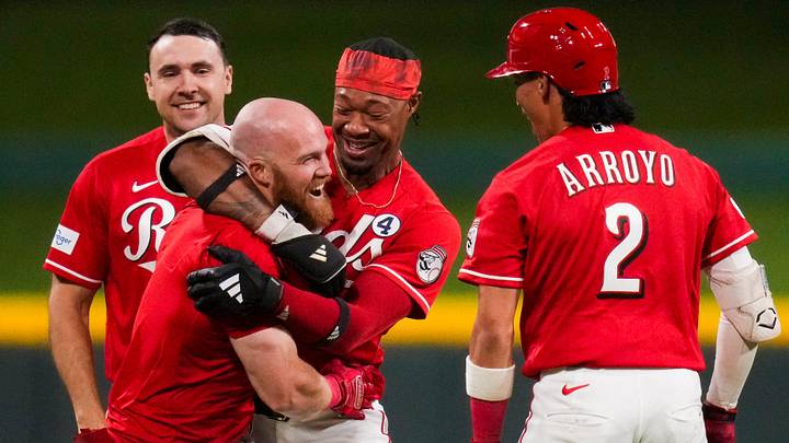 The Reds celebrate a win after Blake Dunn’s single scores Spencer Steer from second base to end the 10th inning of the MLB Interleague game between the Cincinnati Reds and the Kansas City Royals at Great American Ball Park in Cincinnati on Tuesday, June 2, 2026. The Reds won 4-3 on a walkoff hit by Blake Dunn, scoring Spencer Steer from second base in the 10th inning.