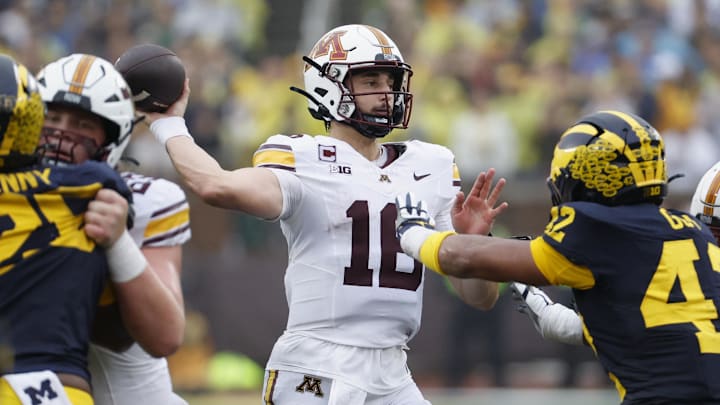 Sep 28, 2024; Ann Arbor, Michigan, USA;   Minnesota Golden Gophers quarterback Max Brosmer (16) passes in the second half against the Michigan Wolverines at Michigan Stadium. Mandatory Credit: Rick Osentoski-Imagn Images