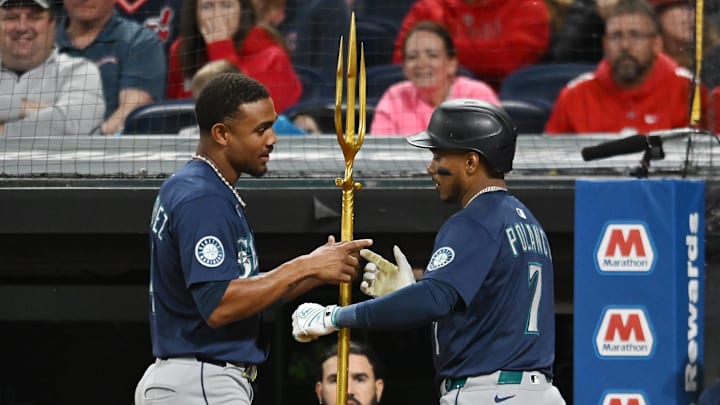Aug 30, 2025; Cleveland, Ohio, USA; Seattle Mariners designated hitter Jorge Polanco (7) celebrates with center fielder Julio Rodriguez (44) after hitting a home run against the Cleveland Guardians during the seventh inning at Progressive Field. Mandatory Credit: Ken Blaze-Imagn Images Aug 30, 2025; Cleveland, Ohio, USA; Seattle Mariners designated hitter Jorge Polanco (7) celebrates with center fielder Julio Rodriguez (44) after hitting a home run against the Cleveland Guardians during the seventh inning at Progressive Field. Mandatory Credit: Ken Blaze-Imagn Images