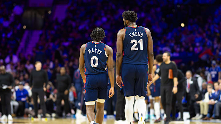 Dec 20, 2023; Philadelphia, Pennsylvania, USA; Philadelphia 76ers center Joel Embiid (21) and guard Tyrese Maxey (0) during a timeout in the second quarter against the Minnesota Timberwolves at Wells Fargo Center. Mandatory Credit: Bill Streicher-Imagn Images Dec 20, 2023; Philadelphia, Pennsylvania, USA; Philadelphia 76ers center Joel Embiid (21) and guard Tyrese Maxey (0) during a timeout in the second quarter against the Minnesota Timberwolves at Wells Fargo Center. Mandatory Credit: Bill Streicher-Imagn Images