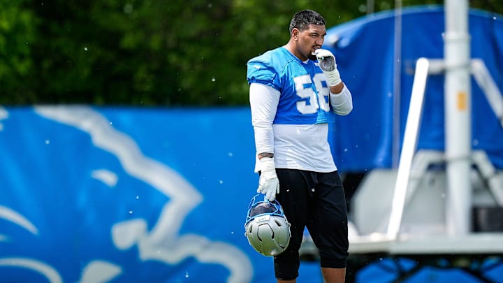 Detroit Lions offensive tackle Penei Sewell (58) watches practice during OTA at Meijer Performance Center in Allen Park on Friday, May 30, 2025.