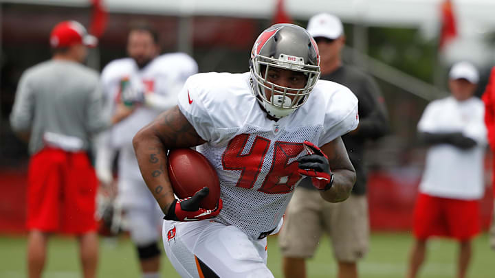 Jul 28, 2014; Tampa, FL, USA; Tampa Bay Buccaneers full back Jorvorskie Lane (46) runs with the ball during training camp at One Buc Place. Mandatory Credit: Kim Klement-Imagn Images