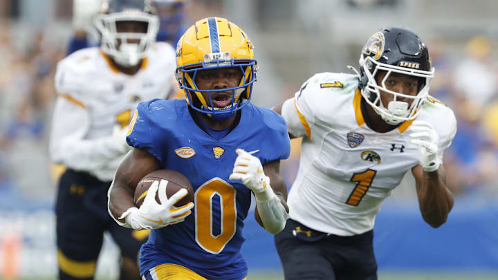 Aug 31, 2024; Pittsburgh, Pennsylvania, USA;  Pittsburgh Panthers running back Desmond Reid (0) runs on his way to scoring a touchdown against the Kent State Golden Flashes during the third quarter at Acrisure Stadium. Pittsburgh won 55-24. Mandatory Credit: Charles LeClaire-Imagn Images