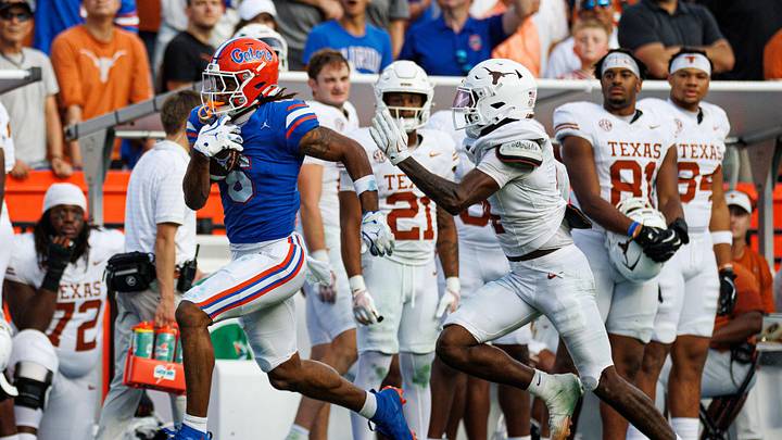 Oct 4, 2025; Gainesville, Florida, USA; Florida Gators wide receiver Dallas Wilson (6) runs with the ball after a catch while Texas Longhorns defensive back Jelani McDonald (4) defends during the second half at Ben Hill Griffin Stadium. Mandatory Credit: Matt Pendleton-Imagn Images