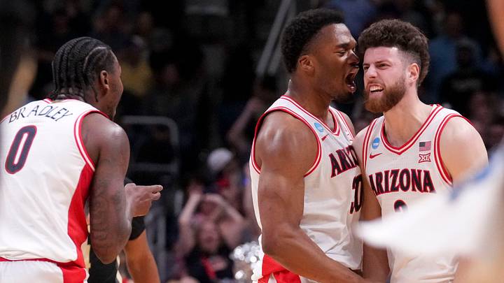 Arizona Wildcats forward Tobe Awaka (30) and guard Anthony Dell'Orso (3) celebrate during a NCAA Tournament game against the Purdue Boilermakers on Saturday, March 28, 2026 at SAP Center in San Jose, Calif. Purdue fell to Arizona 79-64.