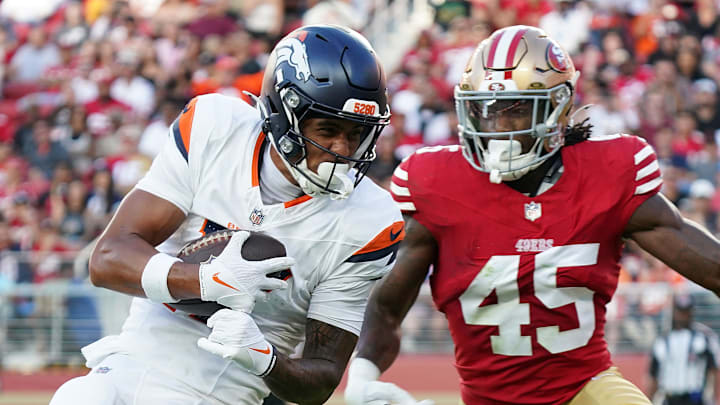 Aug 9, 2025; Santa Clara, California, USA; Denver Broncos wide receiver Devaughn Vele (17) make a reception in the second quarter against San Francisco 49ers linebacker Nick Martin (45) at Levi's Stadium. Mandatory Credit: David Gonzales-Imagn Images Aug 9, 2025; Santa Clara, California, USA; Denver Broncos wide receiver Devaughn Vele (17) make a reception in the second quarter against San Francisco 49ers linebacker Nick Martin (45) at Levi's Stadium. Mandatory Credit: David Gonzales-Imagn Images