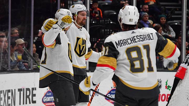 Dec 27, 2023; Anaheim, California, USA; Vegas Golden Knights right wing Mark Stone (61) celebrates his power play goal scored against the Anaheim Ducks with center William Karlsson (71) and right wing Jonathan Marchessault (81) during the second period at Honda Center. Karlsson and Marchessault each provided an assist on the goal. Mandatory Credit: Gary A. Vasquez-USA TODAY Sports