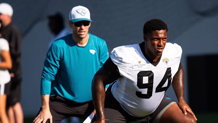 Jacksonville Jaguars defensive tackle Maason Smith (94) stretches during an NFL training camp seventh session at the Miller Electric Center, Thursday, July 31, 2025, in Jacksonville, Fla. 