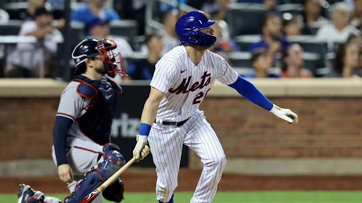 New York Mets left fielder Tyler Naquin (25) watches his home run.