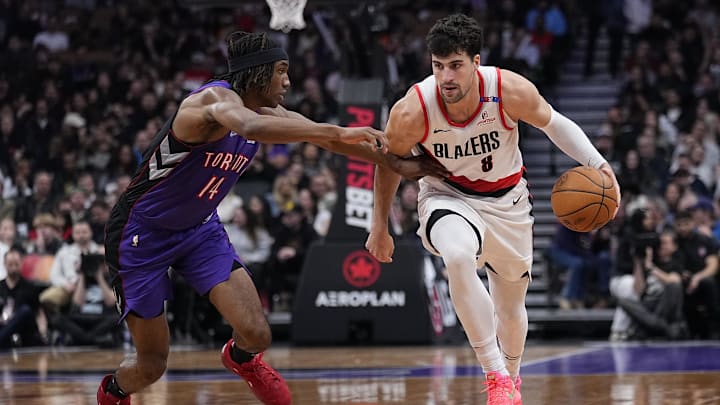 Apr 3, 2025; Toronto, Ontario, CAN; Portland Trail Blazers forward Deni Avdija (8) drives to the net against Toronto Raptors guard Ja'Kobe Walter (14) during the second half at Scotiabank Arena. Mandatory Credit: John E. Sokolowski-Imagn Images Apr 3, 2025; Toronto, Ontario, CAN; Portland Trail Blazers forward Deni Avdija (8) drives to the net against Toronto Raptors guard Ja'Kobe Walter (14) during the second half at Scotiabank Arena. Mandatory Credit: John E. Sokolowski-Imagn Images