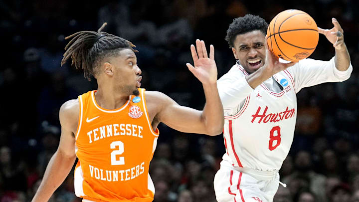 Tennessee Volunteers guard Chaz Lanier (2) guards Houston Cougars guard Mylik Wilson (8) as he passes the ball during the second half of a game Sunday, March 30, 2025, during the Elite Eight round of the NCAA March Madness tournament at Lucas Oil Stadium in Indianapolis. Houston defeated Tennessee 69-50. Tennessee Volunteers guard Chaz Lanier (2) guards Houston Cougars guard Mylik Wilson (8) as he passes the ball during the second half of a game Sunday, March 30, 2025, during the Elite Eight round of the NCAA March Madness tournament at Lucas Oil Stadium in Indianapolis. Houston defeated Tennessee 69-50.
