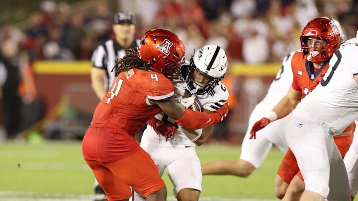 Sep 27, 2025; Ames, Iowa, USA; Iowa State Cyclones running back Dylan Lee (2) runs the football against the Arizona Wildcats during the second half at Jack Trice Stadium. Mandatory Credit: Reese Strickland-Imagn Images Sep 27, 2025; Ames, Iowa, USA; Iowa State Cyclones running back Dylan Lee (2) runs the football against the Arizona Wildcats during the second half at Jack Trice Stadium. Mandatory Credit: Reese Strickland-Imagn Images