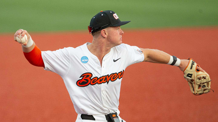 Oregon State's Trent Caraway throws to first base against Tulane in the Corvallis Regional of the NCAA Tournament Friday, May 31, 2024, at Goss Stadium in Corvallis, Ore.