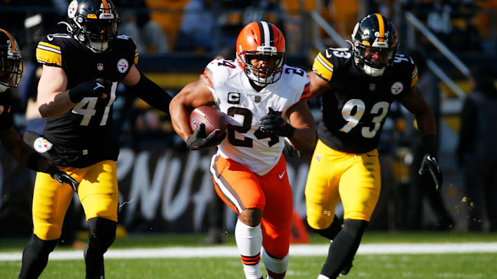 Nick Chubb waves good-bye to Steeler defenders. 