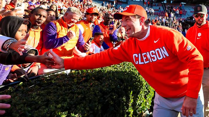 Nov 29, 2025; Columbia, South Carolina, USA; Clemson Tigers head coach Dabo Swinney celebrates following the Tigers 28-14 win over the South Carolina Gamecocks at Williams-Brice Stadium. Mandatory Credit: Jeff Blake-Imagn Images Nov 29, 2025; Columbia, South Carolina, USA; Clemson Tigers head coach Dabo Swinney celebrates following the Tigers 28-14 win over the South Carolina Gamecocks at Williams-Brice Stadium. Mandatory Credit: Jeff Blake-Imagn Images