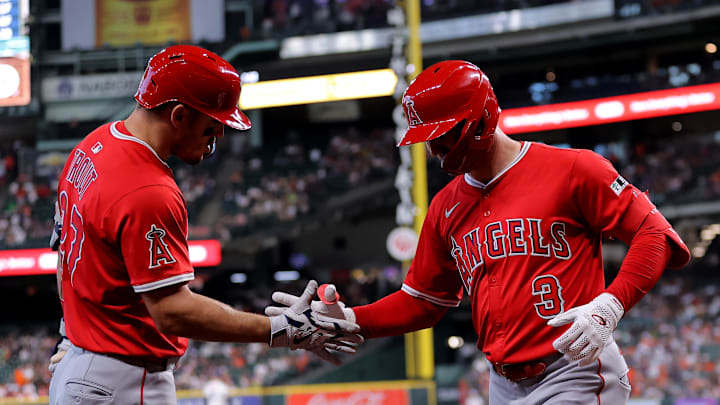 Apr 13, 2025; Houston, Texas, USA; Los Angeles Angels left fielder Taylor Ward (3) shakes hands with Los Angeles Angels designated hitter Mike Trout (27) after hitting a home run against the Houston Astros during the first inning at Daikin Park. Mandatory Credit: Erik Williams-Imagn Images