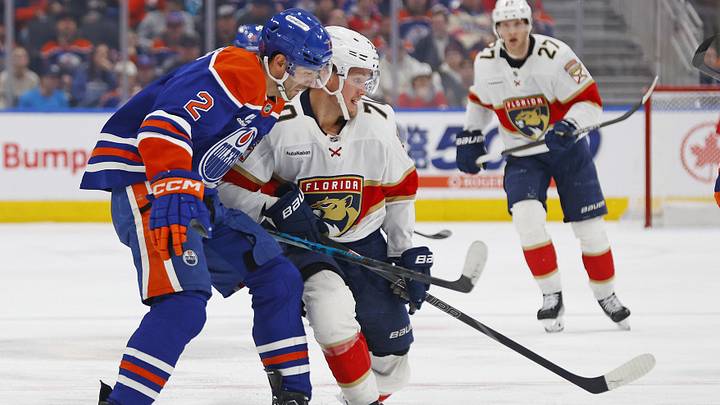 Mar 19, 2026; Edmonton, Alberta, CAN; Edmonton Oilers defensemen Evan Bouchard (2) and Florida Panthers forward Jesper Boqvist (70) skate after the puck during the second period at Rogers Place. Mandatory Credit: Perry Nelson-Imagn Images Mar 19, 2026; Edmonton, Alberta, CAN; Edmonton Oilers defensemen Evan Bouchard (2) and Florida Panthers forward Jesper Boqvist (70) skate after the puck during the second period at Rogers Place. Mandatory Credit: Perry Nelson-Imagn Images