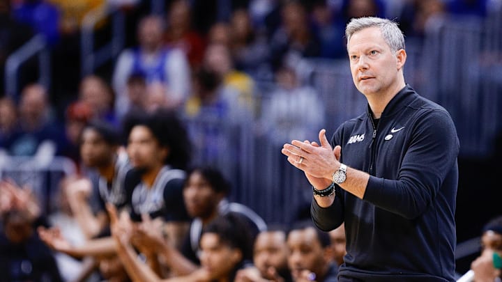 Mar 20, 2025; Denver, CO, USA; VCU Rams head coach Ryan Odom reacts during the first half against the Brigham Young Cougars in the first round of the NCAA Tournament at Ball Arena. Mandatory Credit: Isaiah J. Downing-Imagn Images Mar 20, 2025; Denver, CO, USA; VCU Rams head coach Ryan Odom reacts during the first half against the Brigham Young Cougars in the first round of the NCAA Tournament at Ball Arena. Mandatory Credit: Isaiah J. Downing-Imagn Images