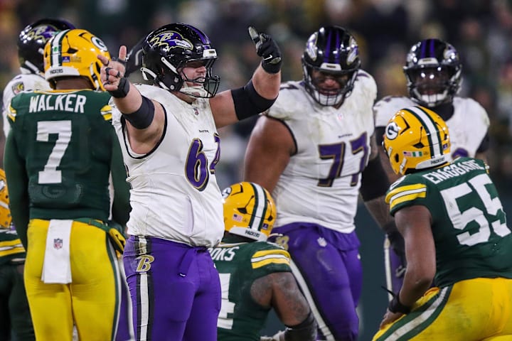 Baltimore Ravens center Tyler Linderbaum (64) reacts after a defensive penalty against the Green Bay Packers.