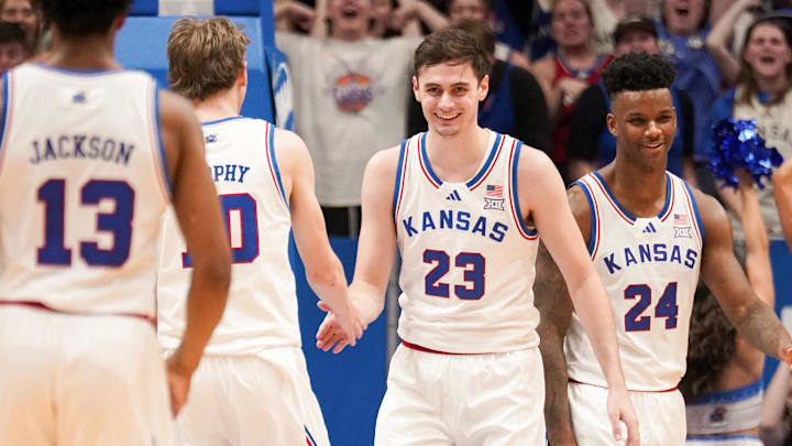 Feb 24, 2024; Lawrence, Kansas, USA; Kansas Jayhawks forward Parker Braun (23) celebrates with guard