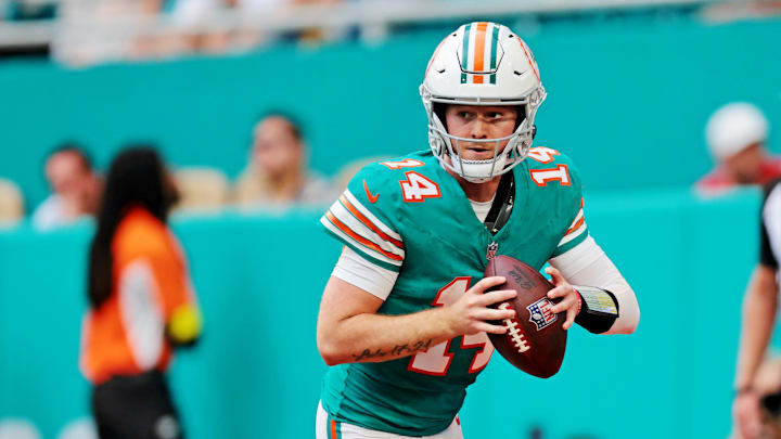 Miami Dolphins quarterback Quinn Ewers (14) runs the ball during the fourth quarter against the Cincinnati Bengals at Hard Rock Stadium. 