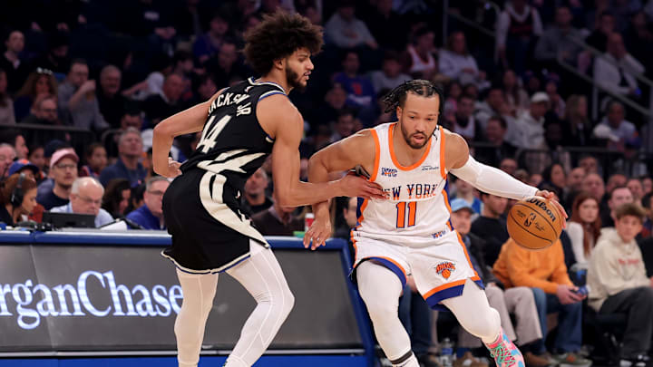 Jan 12, 2025; New York, New York, USA; New York Knicks guard Jalen Brunson (11) controls the ball against Milwaukee Bucks guard Andre Jackson Jr. (44) during the first quarter at Madison Square Garden. Mandatory Credit: Brad Penner-Imagn Images