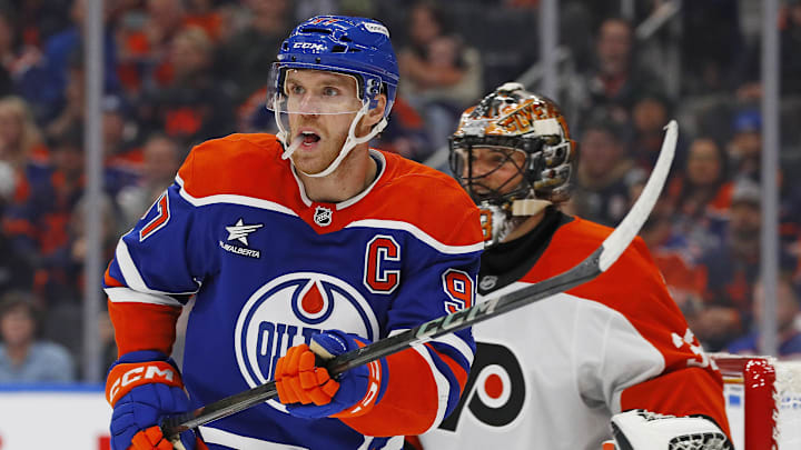 Oct 15, 2024; Edmonton, Alberta, CAN; Edmonton Oilers forward Connor McDavid (97) tries to screen  Philadelphia Flyers goaltender Samuel Ersson (33) during the first period at Rogers Place. Mandatory Credit: Perry Nelson-Imagn Images
