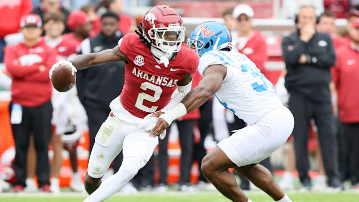 Nov 2, 2024; Fayetteville, Arkansas, USA; Arkansas Razorbackswide receiver Andrew Armstrong (2) runs after a catch in the fourth quarter as Ole Miss Rebels linebacker Tyler Banks (34) defends at Donald W. Reynolds Razorback Stadium. Mississippi won 63-31. Mandatory Credit: Nelson Chenault-Imagn Images Nov 2, 2024; Fayetteville, Arkansas, USA; Arkansas Razorbackswide receiver Andrew Armstrong (2) runs after a catch in the fourth quarter as Ole Miss Rebels linebacker Tyler Banks (34) defends at Donald W. Reynolds Razorback Stadium. Mississippi won 63-31. Mandatory Credit: Nelson Chenault-Imagn Images