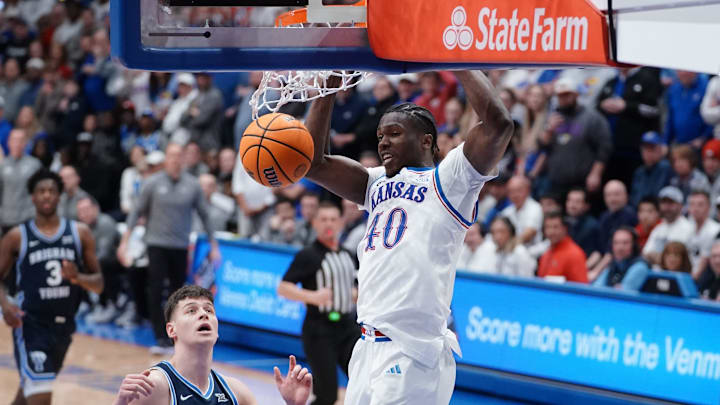 Kansas Jayhawks forward Flory Bidunga (40) dunks the ball against BYU Cougars during the game inside Allen Fieldhouse on Jan. 31, 2026.