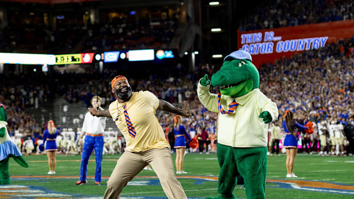 Former Florida Gators linebacker Brandon Spikes performs as Mr. Two-Bits before the game against the Florida State Seminoles at Steve Spurrier Field at Ben Hill Griffin Stadium in Gainesville, FL on Saturday, November 25, 2023. [Matt Pendleton/Gainesville Sun]