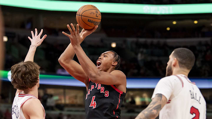 Feb 28, 2025; Chicago, Illinois, USA; Toronto Raptors forward Scottie Barnes (4) goes up for a shot during the first half against the Chicago Bulls at the United Center. Mandatory Credit: Patrick Gorski-Imagn Images