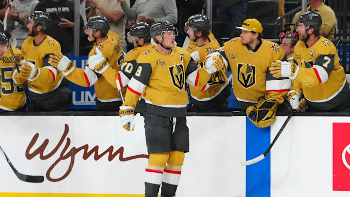 Oct 11, 2024; Las Vegas, Nevada, USA; Vegas Golden Knights center Jack Eichel (9) celebrates with team mates after scoring a goal against the St. Louis Blues during the first period at T-Mobile Arena. Mandatory Credit: Stephen R. Sylvanie-Imagn Images