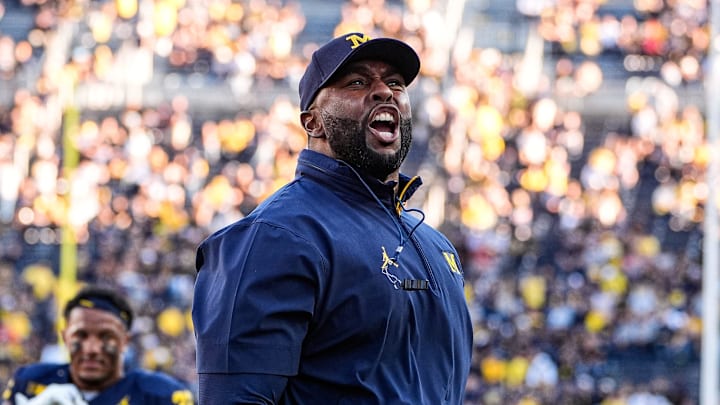 Michigan head coach Sherrone Moore fires up the student section during warm up ahead of the New Mexico game at Michigan Stadium in Ann Arbor on Saturday, August 30, 2025.