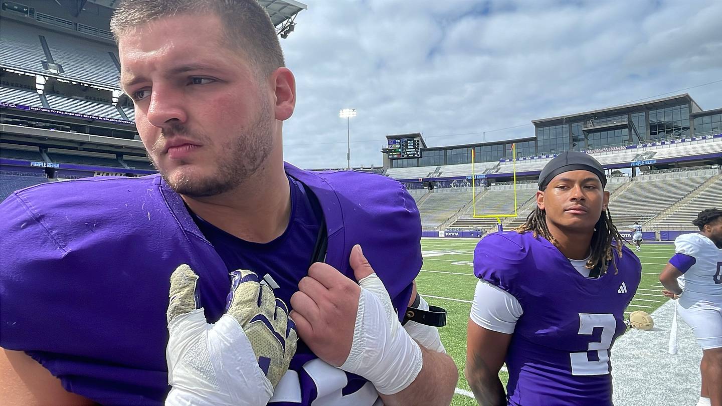 UW's Dieterich Plows the Field Playing Center, Riding a Tractor