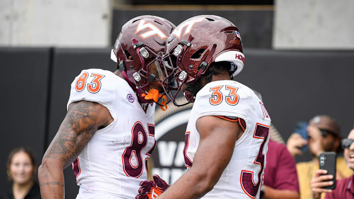 Aug 31, 2024; Nashville, Tennessee, USA;  Virginia Tech Hokies wide receiver Jaylin Lane (83) celebrates the touchdown of running back Bhayshul Tuten (33) gainst the Vanderbilt Commodores during the second half at FirstBank Stadium. Mandatory Credit: Steve Roberts-Imagn Images