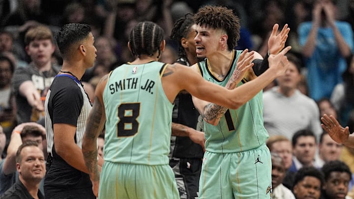 Feb 7, 2025; Charlotte, North Carolina, USA; Charlotte Hornets guard LaMelo Ball (1) argues with referee Mousa Dagher (28) on a call during the second half against the San Antonio Spurs at Spectrum Center. Mandatory Credit: Jim Dedmon-Imagn Images Feb 7, 2025; Charlotte, North Carolina, USA; Charlotte Hornets guard LaMelo Ball (1) argues with referee Mousa Dagher (28) on a call during the second half against the San Antonio Spurs at Spectrum Center. Mandatory Credit: Jim Dedmon-Imagn Images