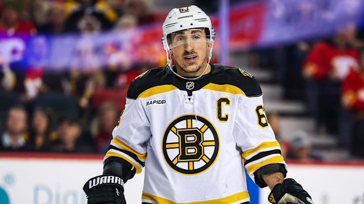 Dec 17, 2024; Calgary, Alberta, CAN; Boston Bruins left wing Brad Marchand (63) during the third period against the Calgary Flames at Scotiabank Saddledome. Mandatory Credit: Sergei Belski-Imagn Images